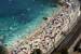 People enjoy the sunny weather on a beac (GettyImages)