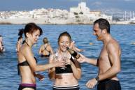 People drink as they take part in a trad Getty Images