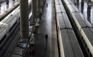 A person stands on the platform at the A