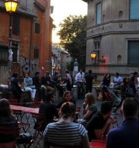 Customers take the aperitif at a bar ter