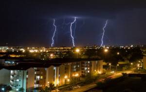 A flash of lightning illuminates the nig