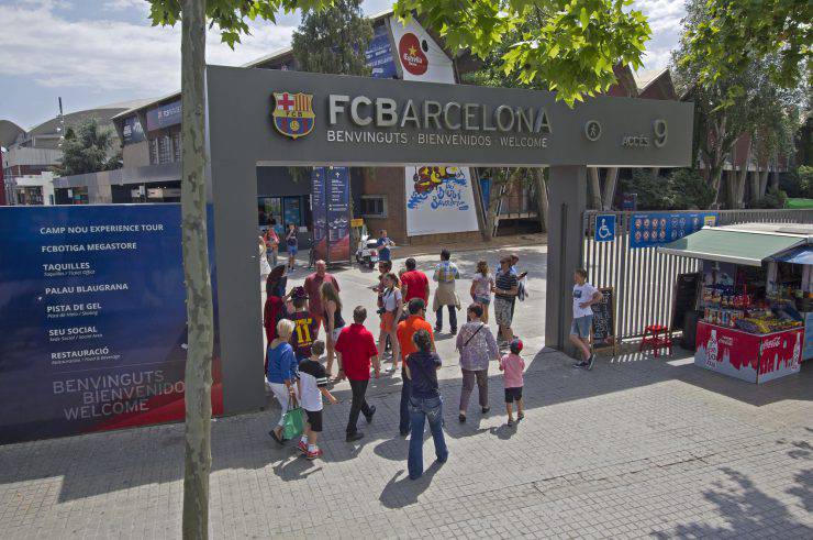 Barcelona, Spain - May 25 2015: Tourists enter the gate of the stadium of FC Barcelona in Barcelona in Spain on May 25 2015.