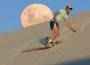 sandboarding snowboard sulla sabbia