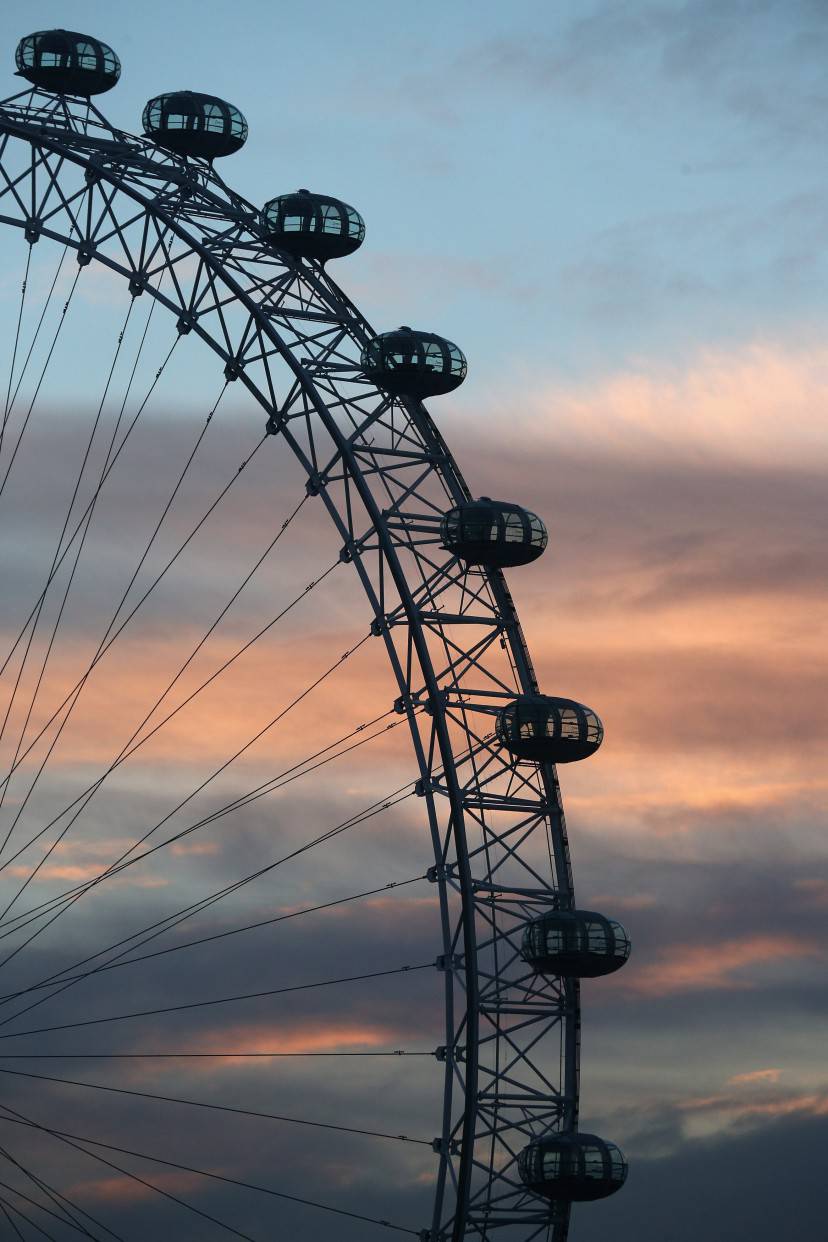 LONDON, ENGLAND - JANUARY 16:  The London Eye Ferris wheel, located on the South bank of the river Thames, rotates at dusk on January 16, 2013 in London, England.  (Photo by Oli Scarff/Getty Images)