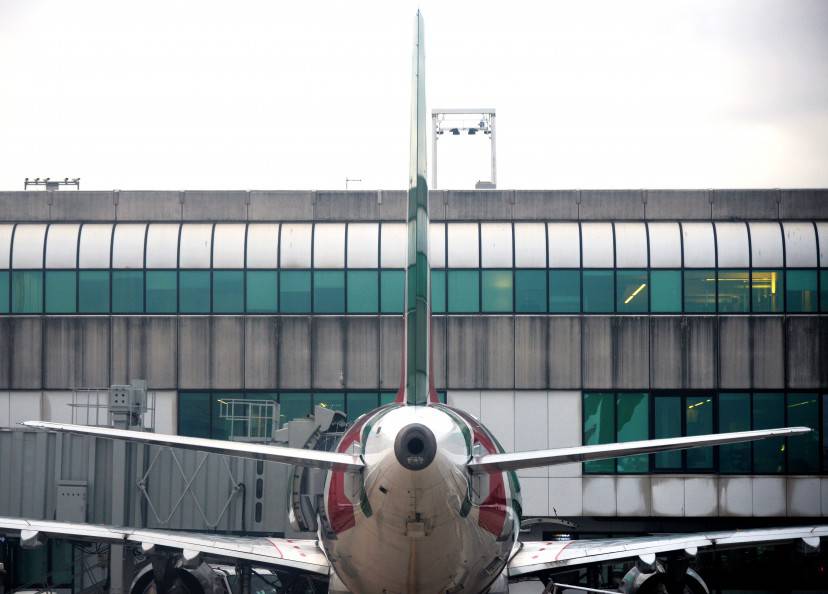 An Alitalia airplane is seen at the Fiumicino airport on January 9, 2014 near Rome. AFP / VINCENZO PINTO (Photo credit should read VINCENZO PINTO/AFP/Getty Images)