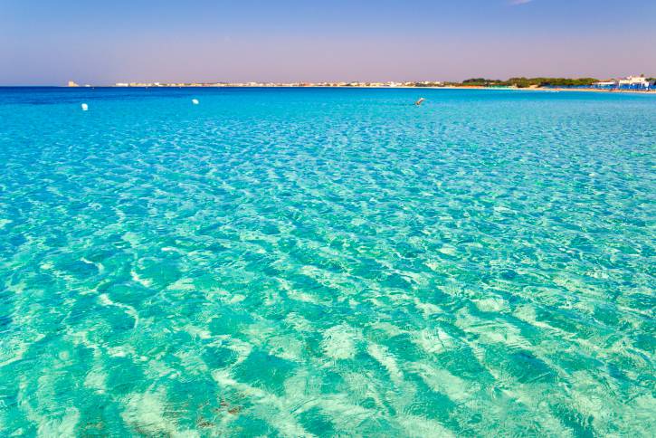 SUMMER.Colors of Apulia:swim in the morning(Salento coast,Lecce).- ITALY(Apulia)-