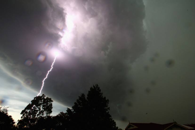 SYDNEY, AUSTRALIA - OCTOBER 13:  A general view is seen of a lightning strike as a severe storm hits Sydney on October 13, 2014 in Sydney, Australia.  (Photo by Mark Kolbe/Getty Images)