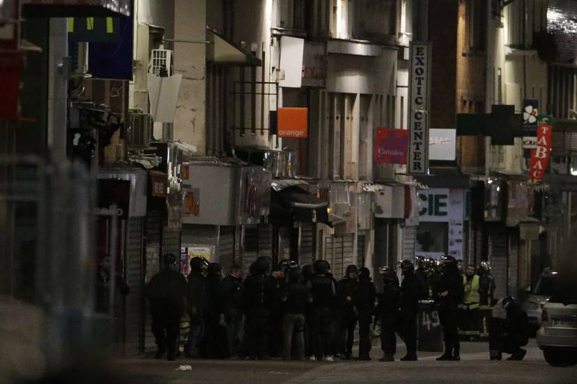 French Police special forces raid an appartment, hunting those behind the attacks that claimed 129 lives in the French capital five days ago, in the northern Paris suburb of Saint-Denis city center, on November 18, 2015. At least one person was killed in an apartment targeted in the operation aimed at the suspected mastermind of the attacks, Belgian Abdelhamid Abaaoud, and police had been wounded in the shootout. AFP PHOTO / KENZO TRIBOUILLARD        (Photo credit should read KENZO TRIBOUILLARD/AFP/Getty Images)