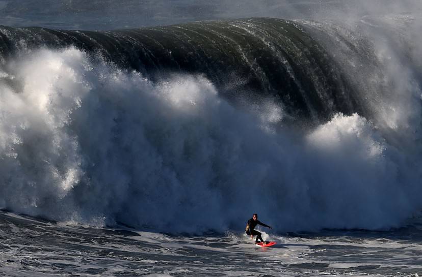 German big wave surfer Sebastian Steudtner drops onto a wave during a surf session at Praia do Norte in Nazare on November 29, 2015. AFP PHOTOFRANCISCO LEONG / AFP / FRANCISCO LEONG (Photo credit should read FRANCISCO LEONG/AFP/Getty Images)