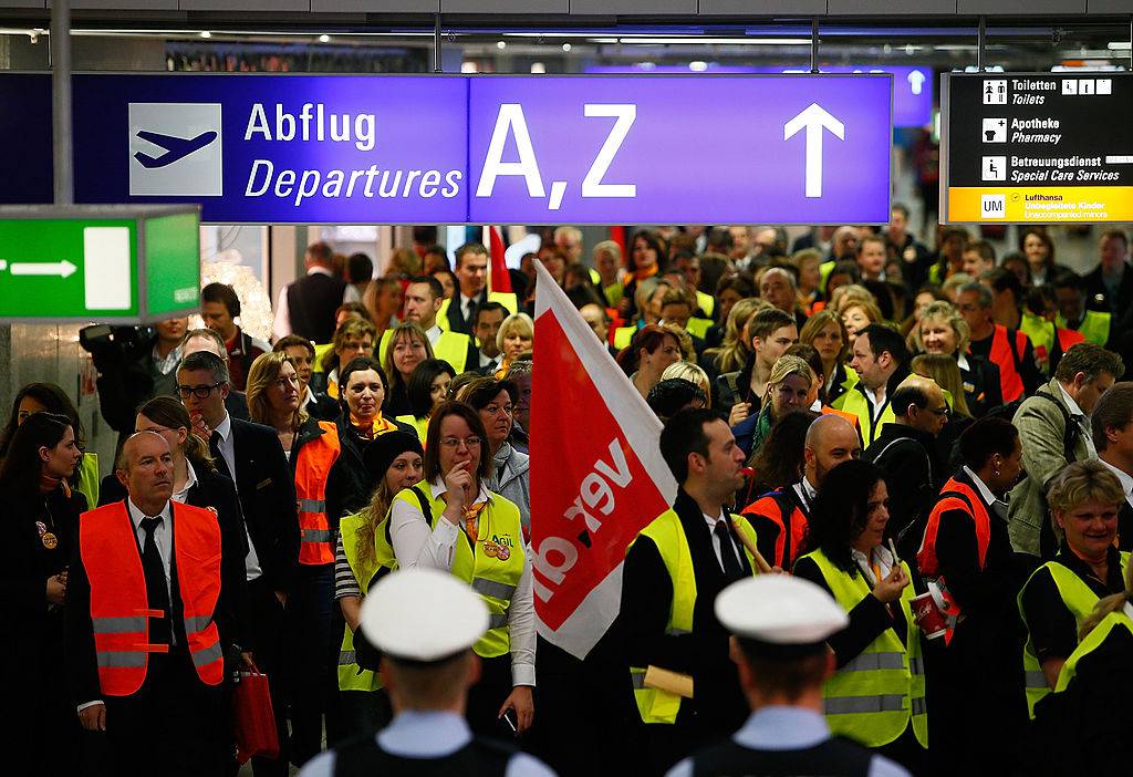 FRANKFURT AM MAIN, GERMANY - APRIL 22:  Lufthansa ground, service and maintenance personnel protest during a nationwide strike at Frankfurt Airport on April 22, 2013 in Frankfurt, Germany. Workers are demaning pay raises and job guarantees and today's strike has forced Lufthansa to cancel approximately 1700 flights.  (Photo by Ralph Orlowski/Getty Images)