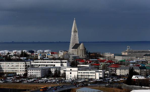 REYKJAVIK, ICELAND - APRIL 07: Buildings surround the Hallgrimskirkja tower in the Icelandic capital on April 7, 2014 in Reykjavik, Iceland. Since the financial meltdown of 2008 which saw the Icelandic economy come close to collapse the island has been slowly recovering and unemployment levels are beginning to return to normal. (Photo by Matt Cardy/Getty Images)