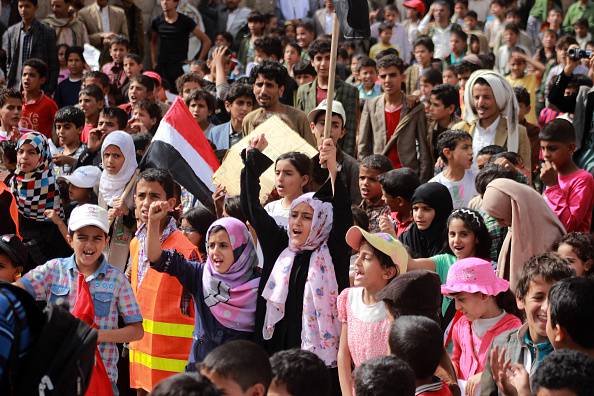 Protesta di bambini davanti all asede Onu di Sanaa, in Yemen (MOHAMMED HUWAIS/AFP/Getty Images)