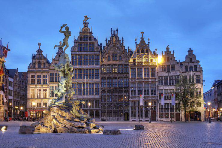 A series of Guildhouses in Grote Markt (Big Market Square) in the old town of Antwerp, Belgium at twilight.