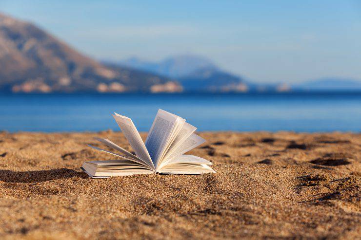 Open book on a beach