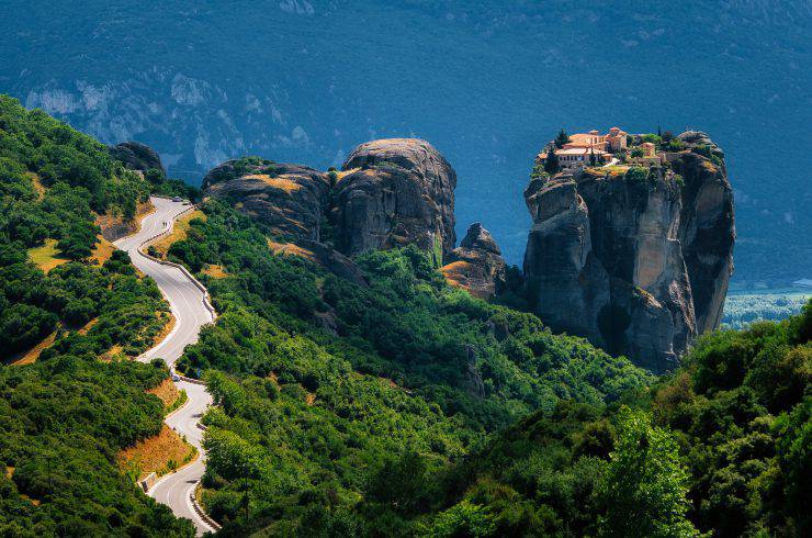 The curve road to Holy Trinity Monastery. Panoramic view of landscape of Meteora, Greece