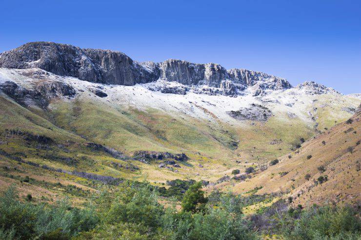 Photo of snow tipped rocky Amatola Mountains