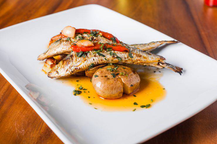 Grilled Sardines Plate with Red Pepper and Potato in a Portuguese Restaurant