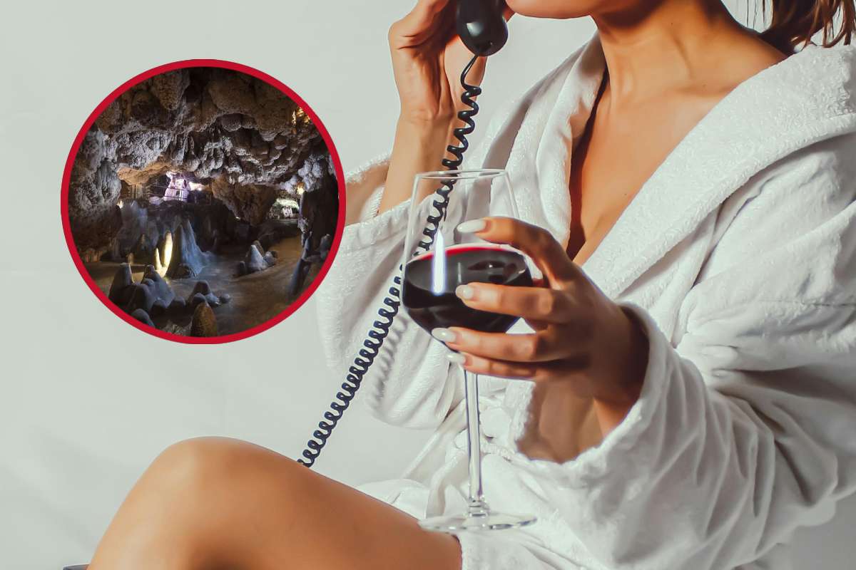 Donna in accappatoio con bicchiere di vino e, in evidenza, delle grotte termali