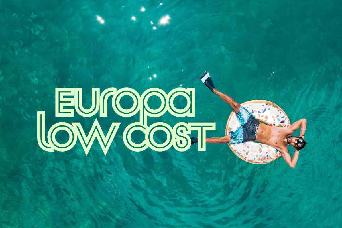 Uomo in acqua e scritta 'Europa low cost'