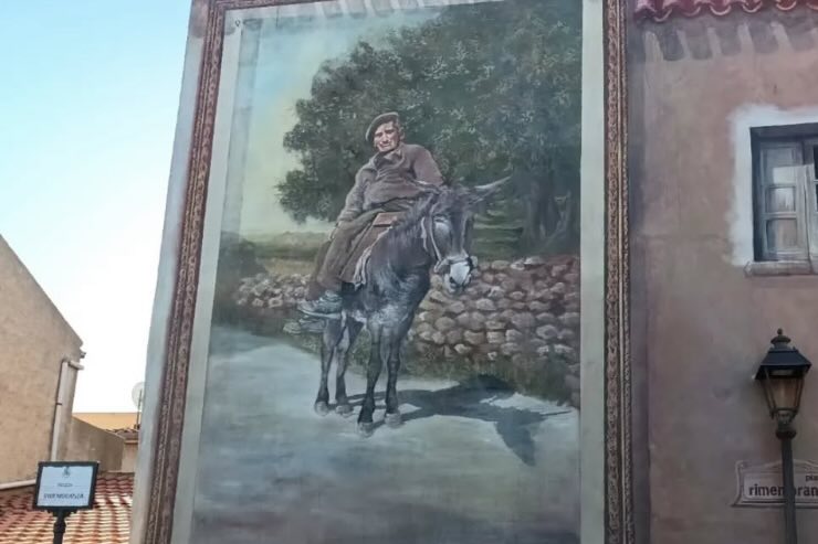 Quadro di un contadino a cavallo di un asinello