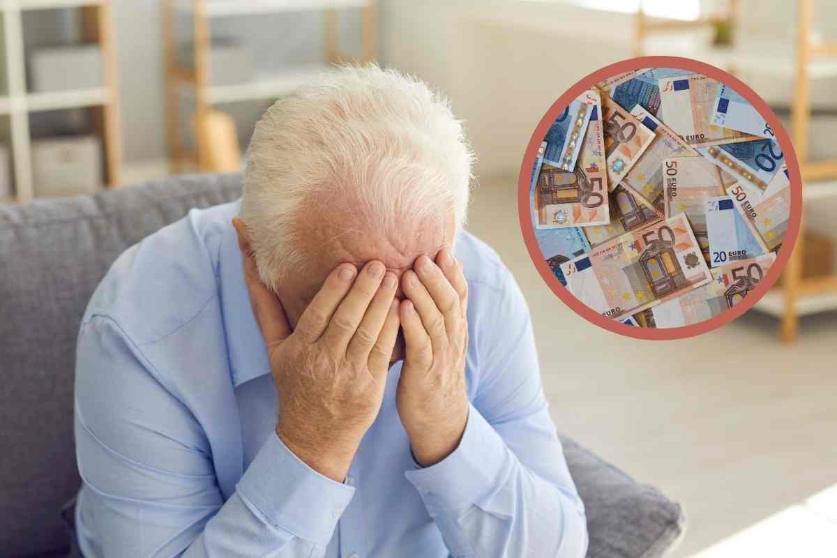 Uomo con mani sul volto