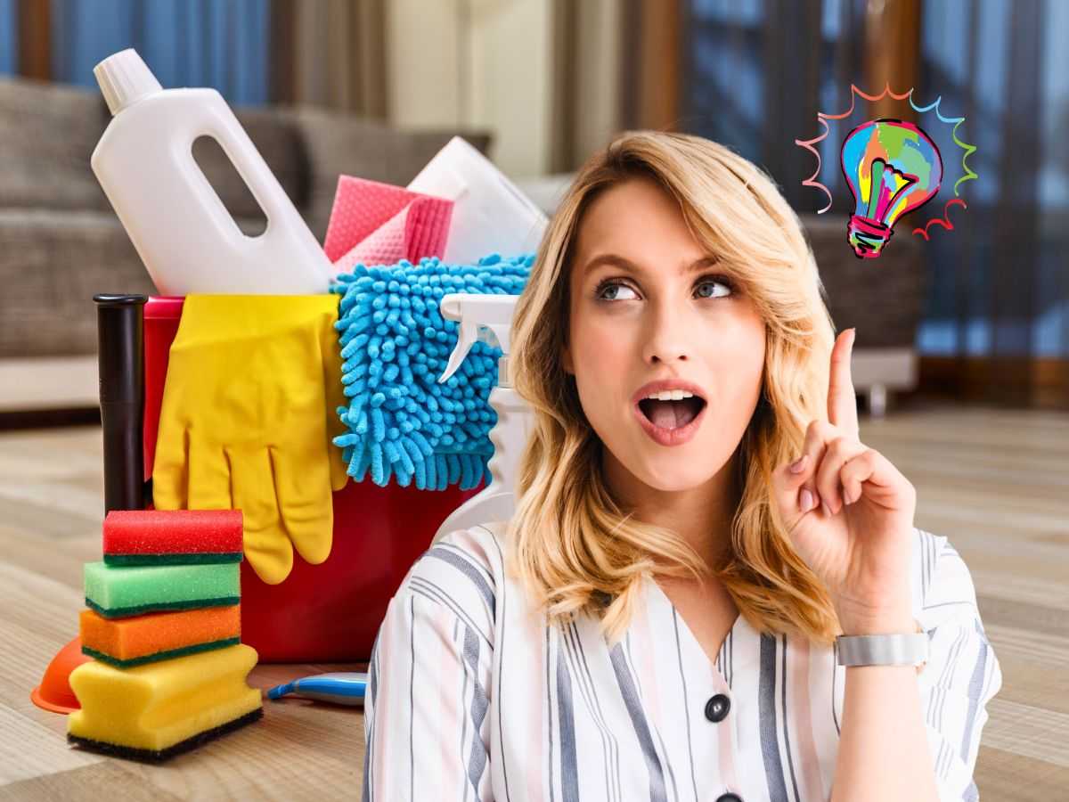 Donna che ha un'idea e strumenti per la pulizia della casa