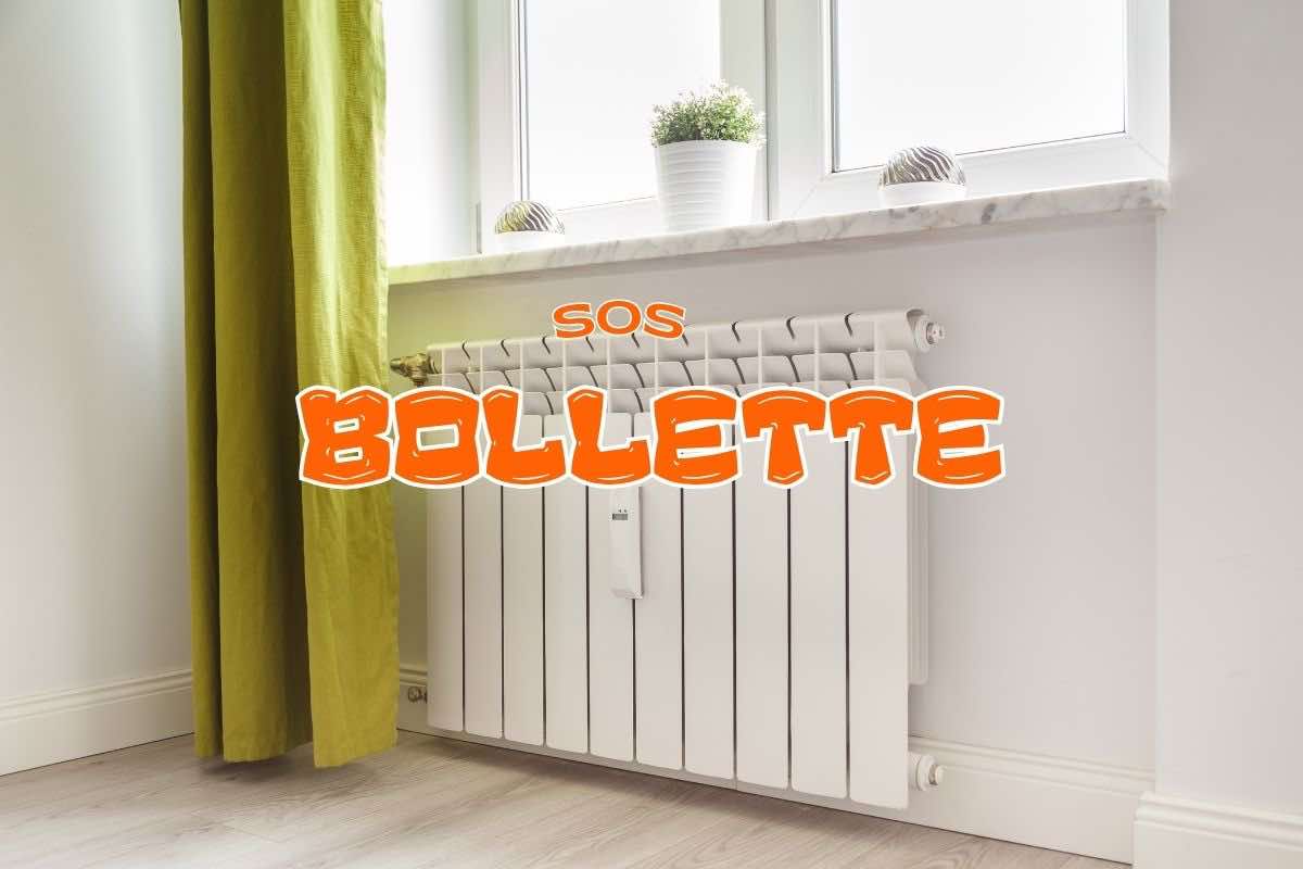 Termosifone e scritta "sos bollette"